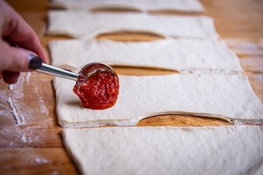 add pizza sauce