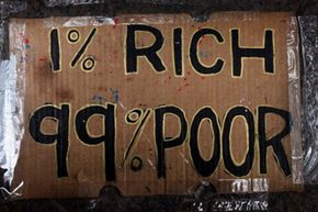 Occupy Wall Street protests on behalf of the &quot;99 percent.&quot; See more protesting pictures.